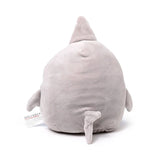 Back view of the soft grey Archie the Shark plush toy, showing its dorsal fin, tail fin, and side fins, with a care label visible.
