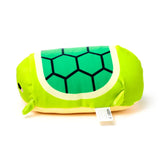 Angled view of a soft, lime green turtle plush toy with a dark green hexagonal shell pattern, cream outline, and tiny flippers.