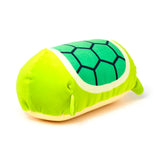 Vibrant lime green Squidglys turtle plush toy, showing its dark green hexagonal shell pattern and pale yellow belly, against a white background.