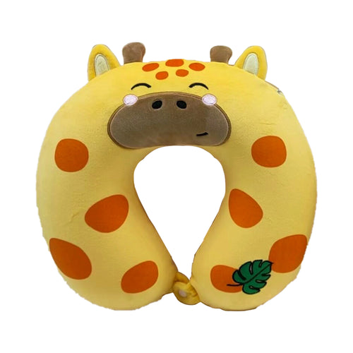 Front view of a plush yellow giraffe memory foam travel pillow, featuring orange spots, an embroidered smiling giraffe face with brown snout, ears, and ossicones, plus a green leaf detail on the lower right.