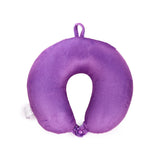 Overhead view of a purple plush U-shaped travel pillow, showing a hanging loop and a snap fastener.