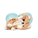Angled view of an Adoramals Shuggs the Shiba Inu 2-in-1 plush toy, in light brown and cream, resting against a light blue U-shaped travel pillow.