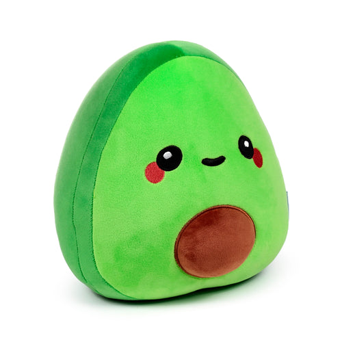 Angled view of Pedro the Avocado plush toy, green with embroidered eyes, red cheeks, and a brown pit.