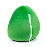 Angled view of a bright green plush avocado-shaped travel pillow and toy, with a visible white zip and small white tag.