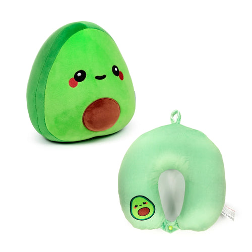 Angled view of a 2-in-1 avocado plush toy and travel pillow, featuring the green avocado plush with embroidered facial features and the light green U-shaped neck pillow displaying a small avocado motif, on a white background.