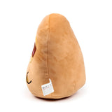 Side profile of a Squidglys Adoramals Cody the Sloth plush toy, light brown in colour, showing its soft texture, a partial embroidered face, and a fabric care label.