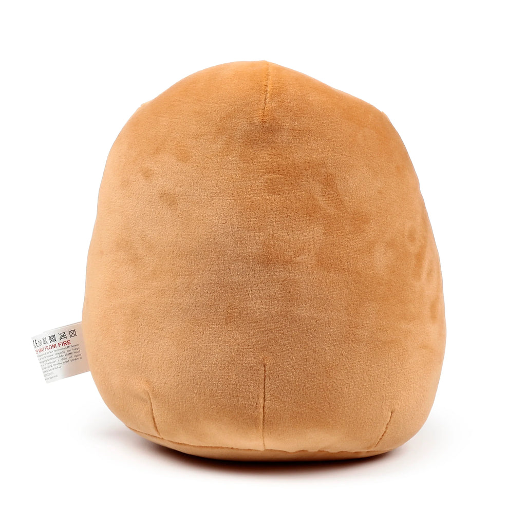 Back view of a rounded, light brown Squidglys plush toy, showing its soft texture and a visible care label.