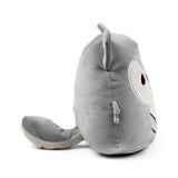 Angled view of the grey, soft Squidglys Adoramals Dorian the Wolf plush toy, showing its pointed ears, visible white muzzle, pink nose, embroidered black eye, and tail.