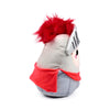 Plush knight toy, angled view, featuring a grey helmet with spiky red hair and a red cape, showing one eye and pink cheek detail.