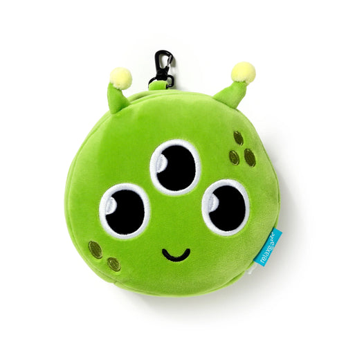 Front view of a bright green plush Space Cadet Alien travel pillow, featuring three embroidered eyes, a smiley mouth, yellow-tipped antennae, and dark green spots, with a black carabiner clip at the top and a blue 'Relaxeazzz' tag.