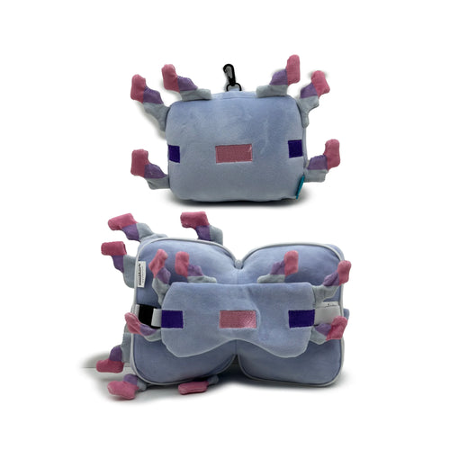 Minecraft Axolotl travel pillow and eye mask set, featuring a light blue plush axolotl toy with pink and purple gills and embroidered details. The image shows two views: compact with a black carabiner clip, and unfolded as a U-shaped neck pillow with an integrated eye mask.