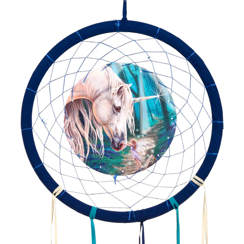 Front view of a dark blue dreamcatcher, featuring a central illustration of a white unicorn nuzzling a small fairy in a magical blue forest, with cream and teal ribbons hanging below.