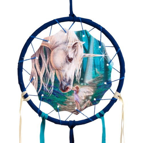 Small dreamcatcher with a dark blue frame, featuring a central fabric panel depicting a white unicorn's head and a small fairy in a magical teal and green forest. Blue and cream ribbons hang from the bottom, shown in a front-on view.
