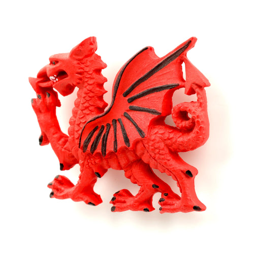 Welsh Dragon magnet, front view, in vibrant red with black wings and claws, on a white background.