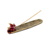 Ashcatcher incense burner featuring a red dragon figure at one end and a long gold tray embossed with mystical symbols. An incense stick is held in the burner, shown from a slightly elevated 3/4 view on a white background.