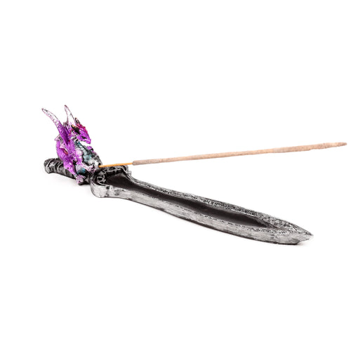 Angled view of a metallic grey sword-shaped incense burner, intricately patterned, featuring a mini amethyst-coloured dragon at the hilt with an incense stick inserted.