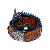Angled view of a dragon incense burner, featuring a coiled blue and purple scaled dragon around a central basin with orange and red flame detailing, a metallic silver incense holder, and a decorative Celtic knot motif.