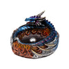 Angled view of a detailed mythical dragon incense burner. The blue and purple dragon coils around a central silver incense holder, with the base featuring intricate orange and red flame-like designs.