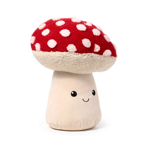 Front view of a plush mushroom toadstool door stop, featuring a red cap with white spots and a cream stem with a smiling face.