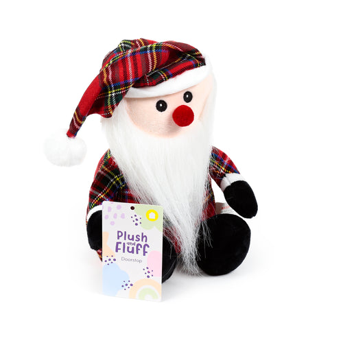 Angled view of a Scottish tartan gonk door stop, with a white beard, red nose, and a red, green, and yellow tartan hat finished with a white pompom.