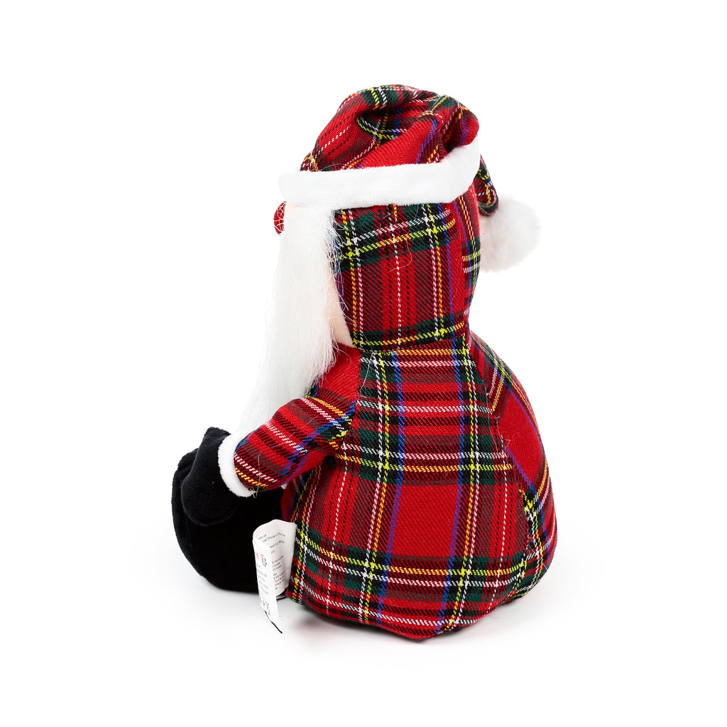 Angled rear view of a gonk door stop, dressed in red Scottish tartan with a white beard, matching hat, and black feet.