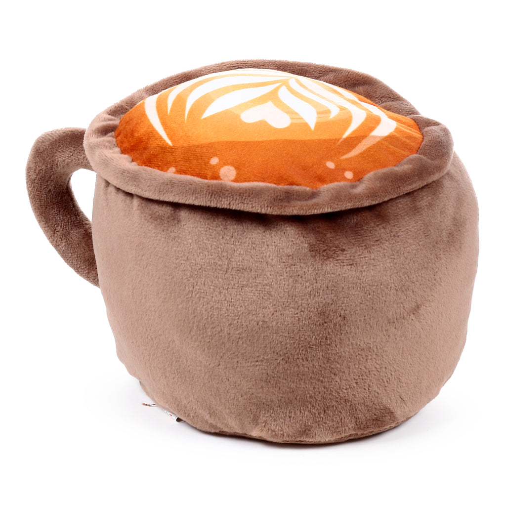Angled view of a plush door stop shaped like a brown cappuccino cup, featuring an orange top with white latte art patterns and a handle.