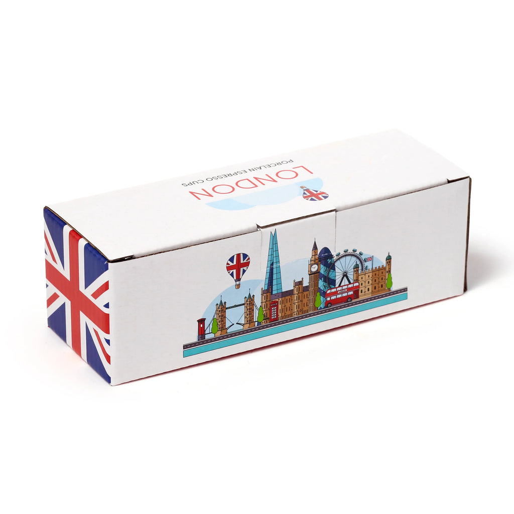 Angled view of a white cardboard box for porcelain espresso cups, featuring illustrations of London landmarks and text reading 'LONDON PORCELAIN ESPRESSO CUPS' on the top, and a Union Jack flag design on one end.