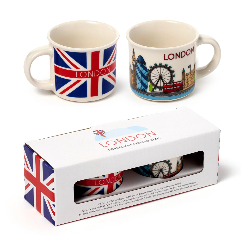 Overhead product view of a set of 2 porcelain espresso cups and their open white packaging box. One cup features a Union Jack flag design, while the other displays London landmarks.