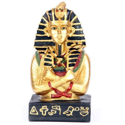 Front view of a golden and black decorative Egyptian Tutankhamen bust ornament with a striped headdress, resting on a black base with gold symbols, on a white background.