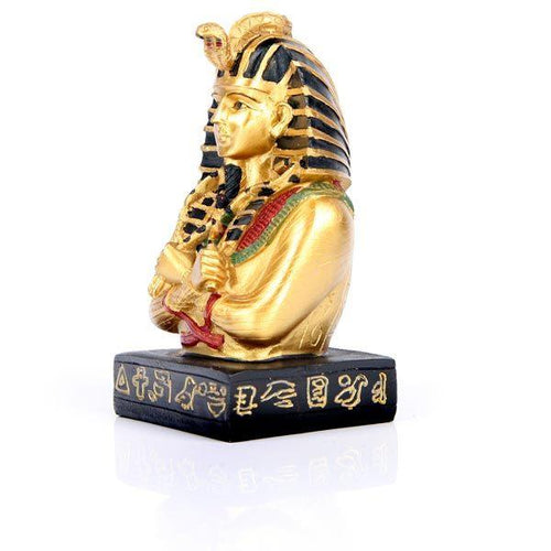 Gold and black decorative Egyptian Tutankhamen bust ornament with hieroglyphic base, 3/4 side view.