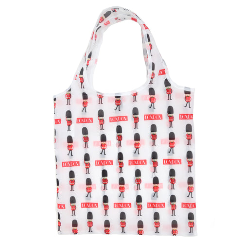 Front view of a white shopping tote bag with a repeating pattern of red London Guardsmen and 'LONDON' text.