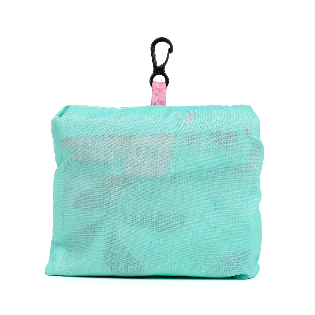 Aqua RPET shopping tote bag, compactly folded and secured with a black carabiner clip with a pink loop, presented against a white background.