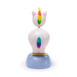 Back view of a white solar pal unicorn figurine, showcasing its rainbow mane and tail, on a light blue base.