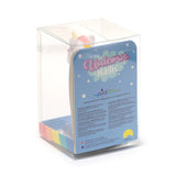 Angled view of a Solar Pal Unicorn Magic toy in clear box packaging, revealing the white unicorn's head with a yellow horn and pink mane above a blue display card that reads 'Unicorn Magic', set against a rainbow striped packaging base.