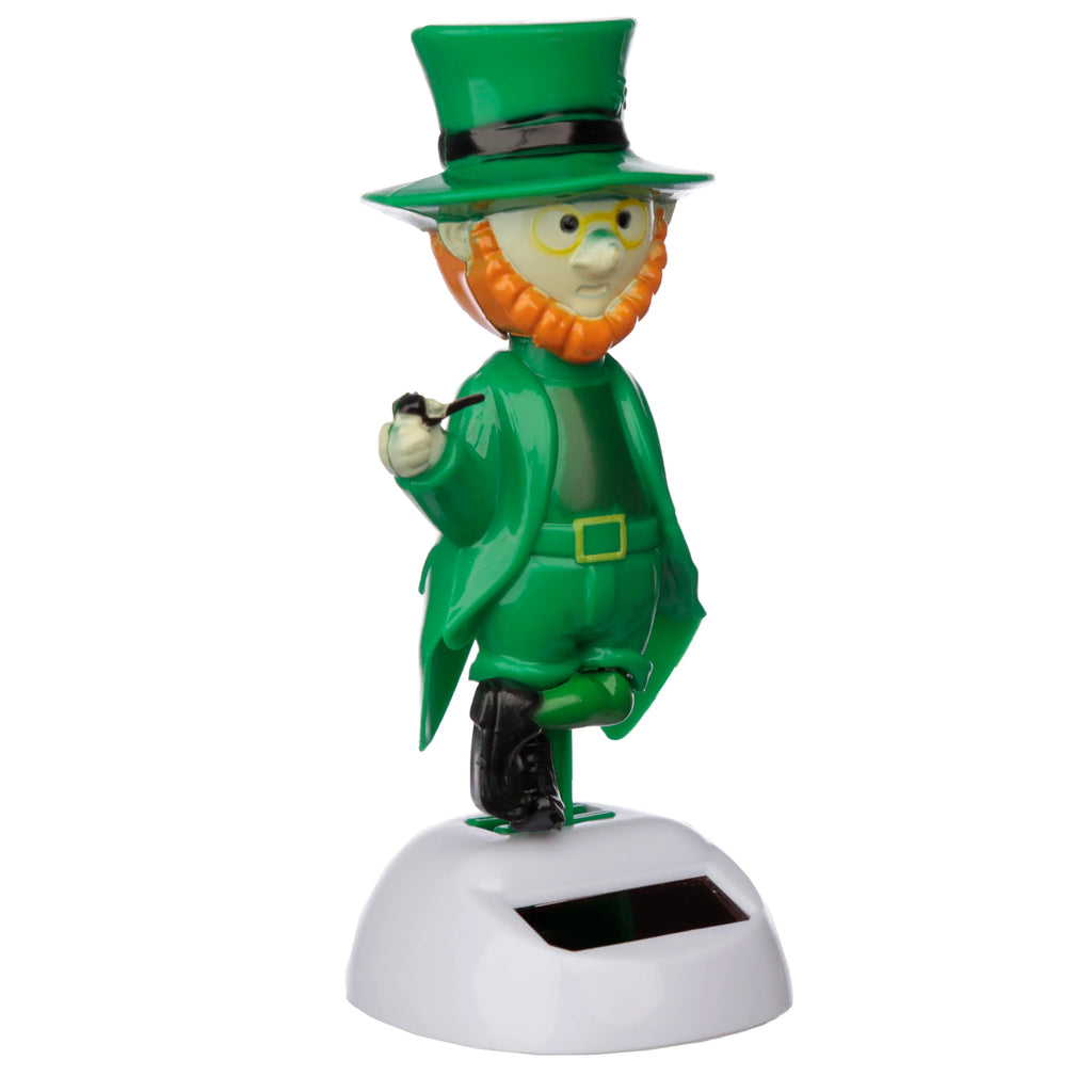 Front view of a Leprechaun Solar Pal figurine featuring a green top hat and coat, orange beard, yellow glasses, holding a pipe, and standing on one leg on a white base with a solar panel.