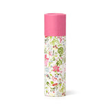 Front view of a pink-capped solid perfumed stick balm with a white botanical floral design.