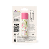 Back view of a solid perfumed stick balm in pink and white botanical floral packaging, displaying product information and usage instructions.