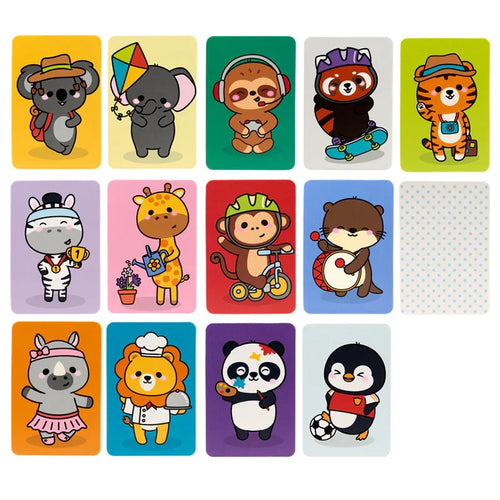 Overhead view of colourful kids' memory game cards, each depicting a different cartoon wild animal, including a koala, elephant, sloth, red panda, tiger, zebra, giraffe, monkey, otter, rhinoceros, lion, panda, and penguin.