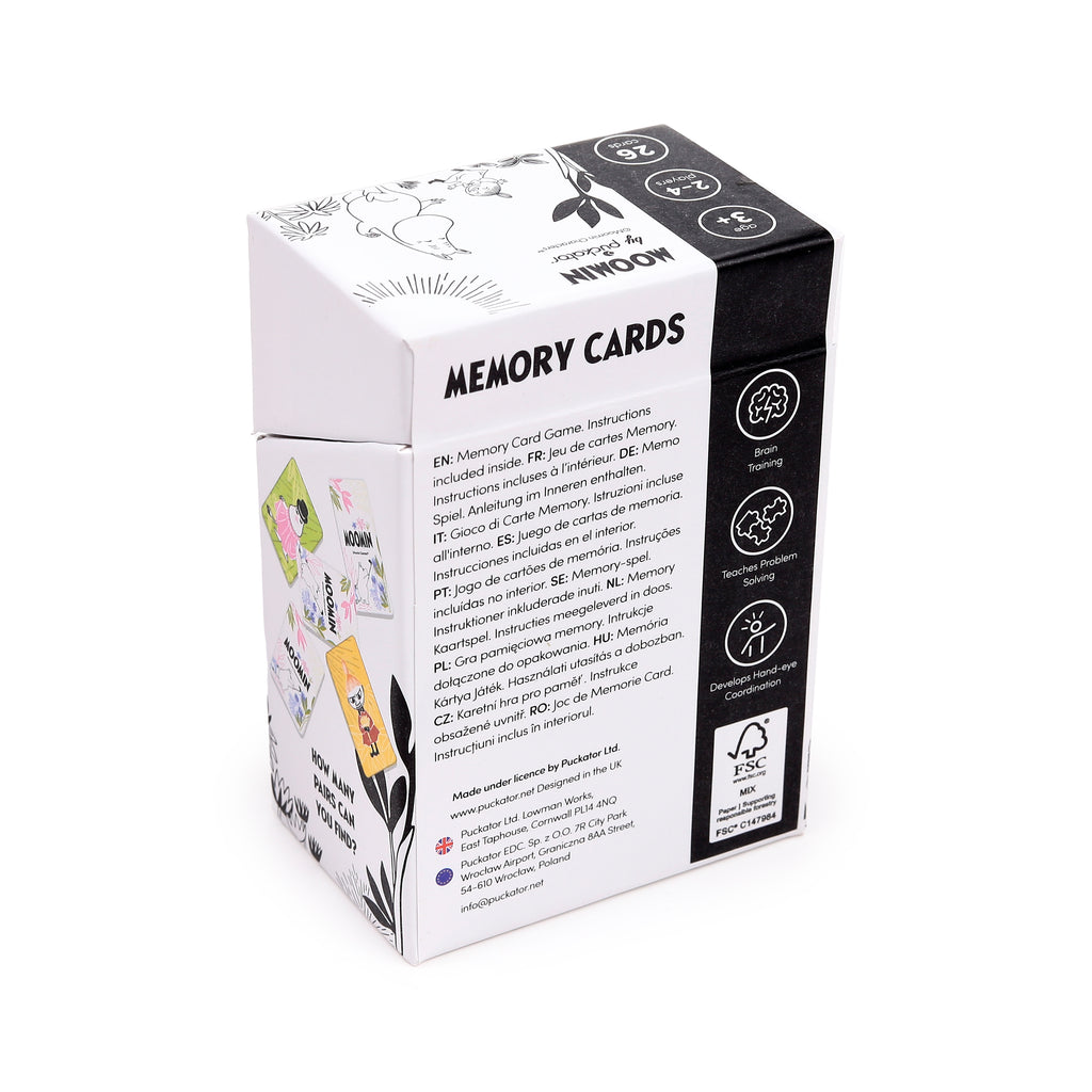 Angled view of a white and black kids' Moomin memory card set box, detailing 26 cards, 2-4 players, Age 3+, Brain Training, Teaches Problem Solving, Develops Hand-eye Coordination. Visible are colourful Moomin character cards on the packaging.
