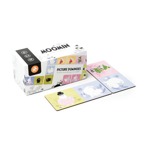 Angled view of a Kids Moomin Picture Dominoes set. The white product box, featuring 'Moomin' text and character illustrations on its visible top and side, is displayed with several rectangular domino tiles. These tiles showcase colourful Moomin characters on pastel backgrounds, laid out in front of the box.