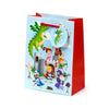 Medium gift bag, front angled view, with a light blue background illustrating a knights and dragons scene. Details include a large green dragon, a castle, various knights, a princess, a wizard, and an archer. It has red side panels and braided red rope handles.