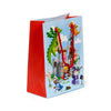 Angled front view of a medium gift bag, featuring a light blue panel with a colourful cartoon illustration of knights, dragons, a princess, and a wizard around a castle, complemented by solid red side panels and red rope handles.