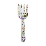Overhead view of a white gardening hand fork, featuring a colourful floral and botanical pattern with various flowers, leaves, berries, and bees, on a white background.