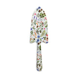 Top view of a white gardening trowel featuring a colourful Nectar Meadows floral and bee pattern.
