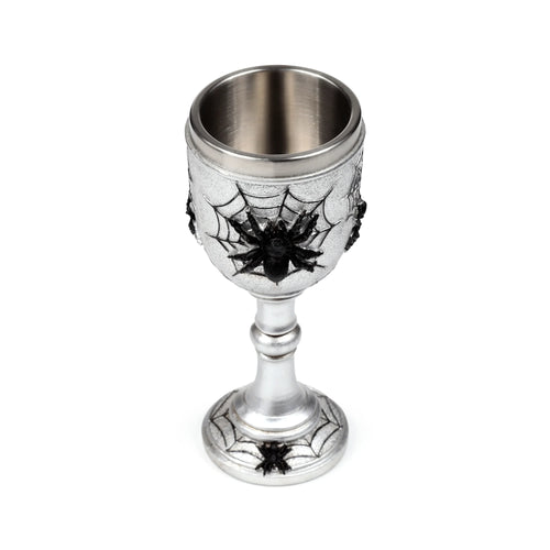 Angled view of a silver-coloured decorative goblet with a metallic inner cup, featuring textured black spider web and spider designs.