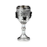 Silver-coloured decorative goblet with black spider web patterns and applied black spiders, featuring a metallic stainless steel interior liner and a fluted stem.