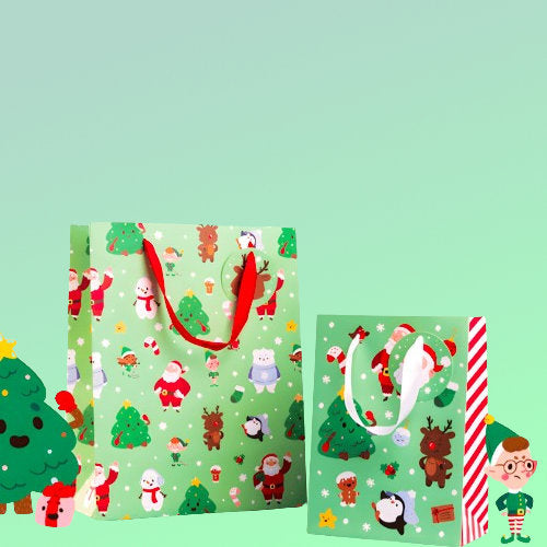 Two Christmas-themed gift bags with cartoon characters on a light green background