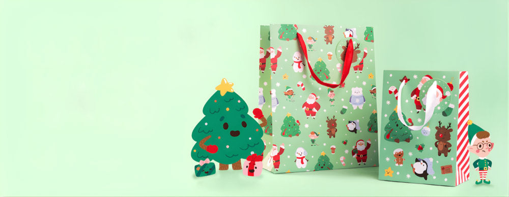 Two Christmas-themed gift bags with cartoon characters on a light green background