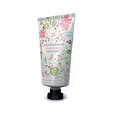 Angled view of a white Julie Dodsworth 50ml hand cream tube, featuring a pink botanical floral pattern with 'Strawberry Hand Cream' text and a black hexagonal cap.
