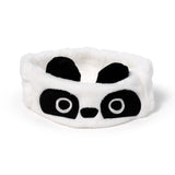 Front view of a plush white panda headband with black ears, eyes, and nose.